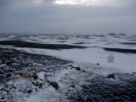 Canada - winter at Iceland.. this tiny chair standing in the storm in a desolate landscape